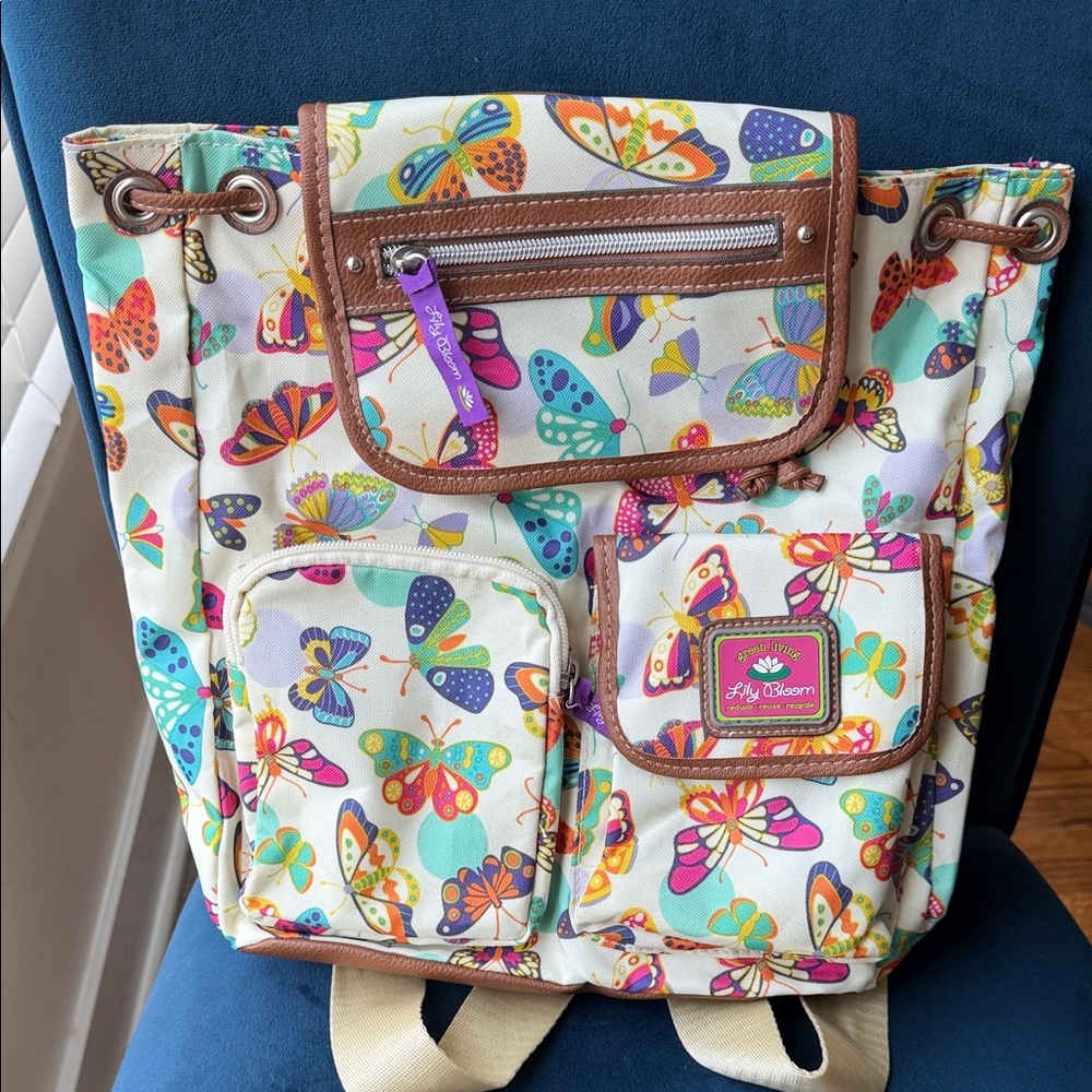 Lily Bloom Multicolor Butterfly Canvas Backpack with Brown Trim